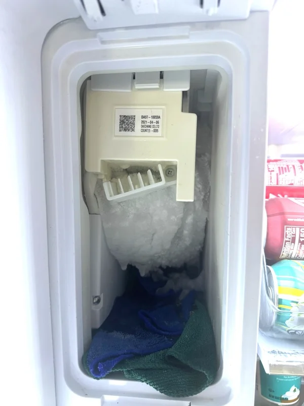 LG refrigerator internal components during repair